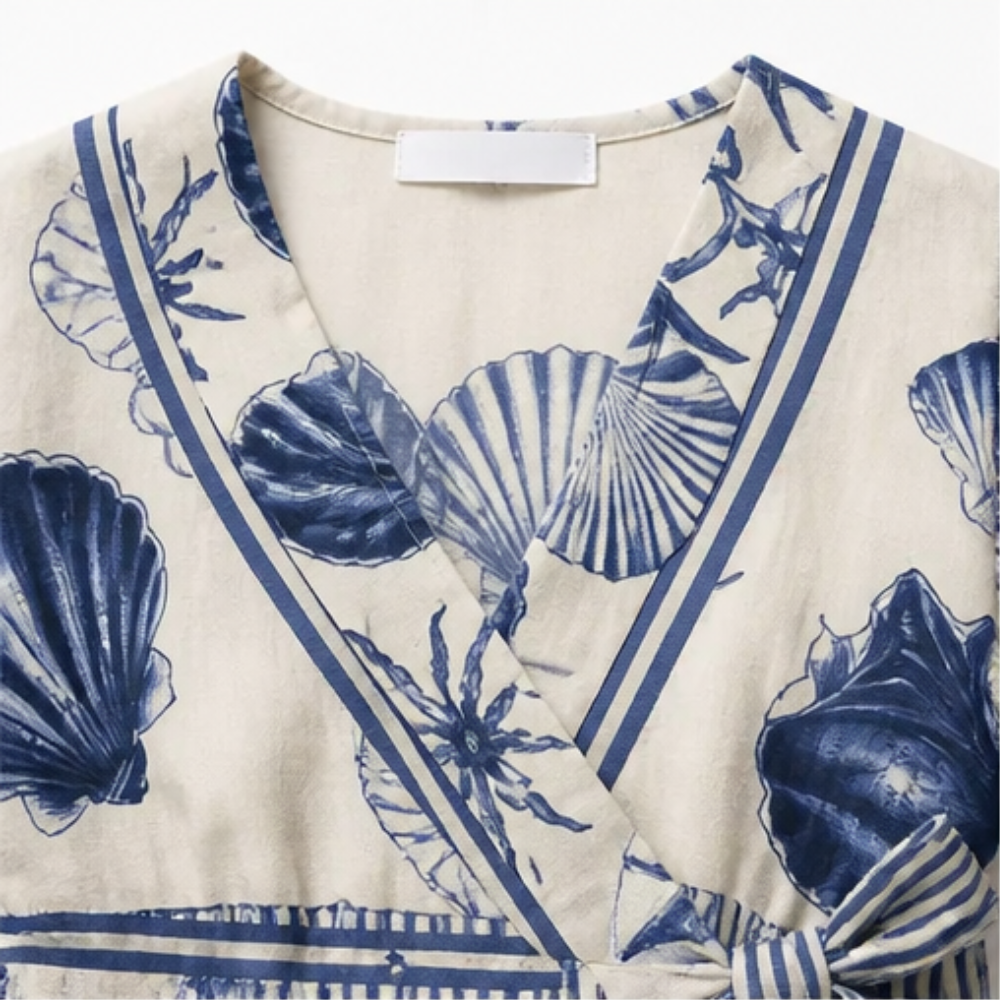 Shellini™ – Coastal Shell Print Wrap Romper