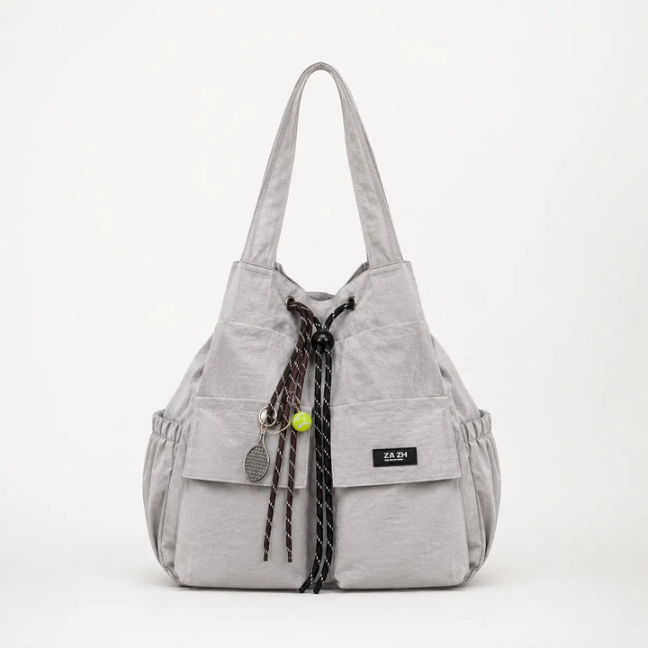 Carryall – Convertible Drawstring Canvas Tote Backpack with Cargo Pockets